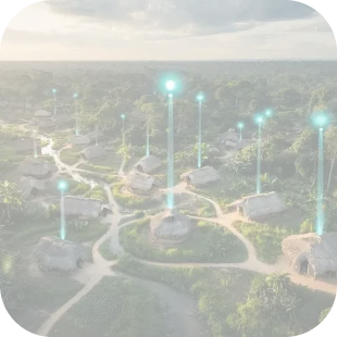 Rural village with glowing signals showing Overcome's community-based health hub deployment